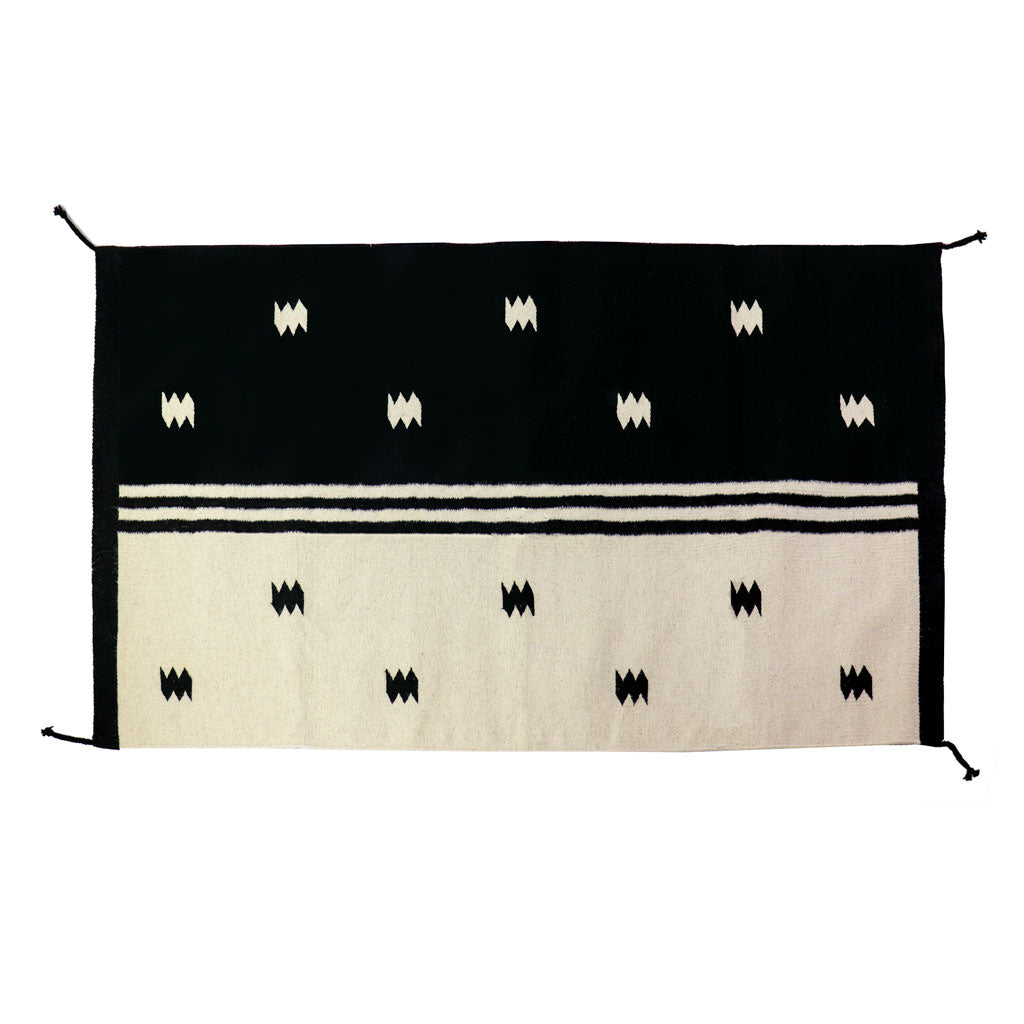 http://princeandpom.com/cdn/shop/products/Black-and-Ivory-Spotted-Zapotec-Rug.jpg?v=1656021766