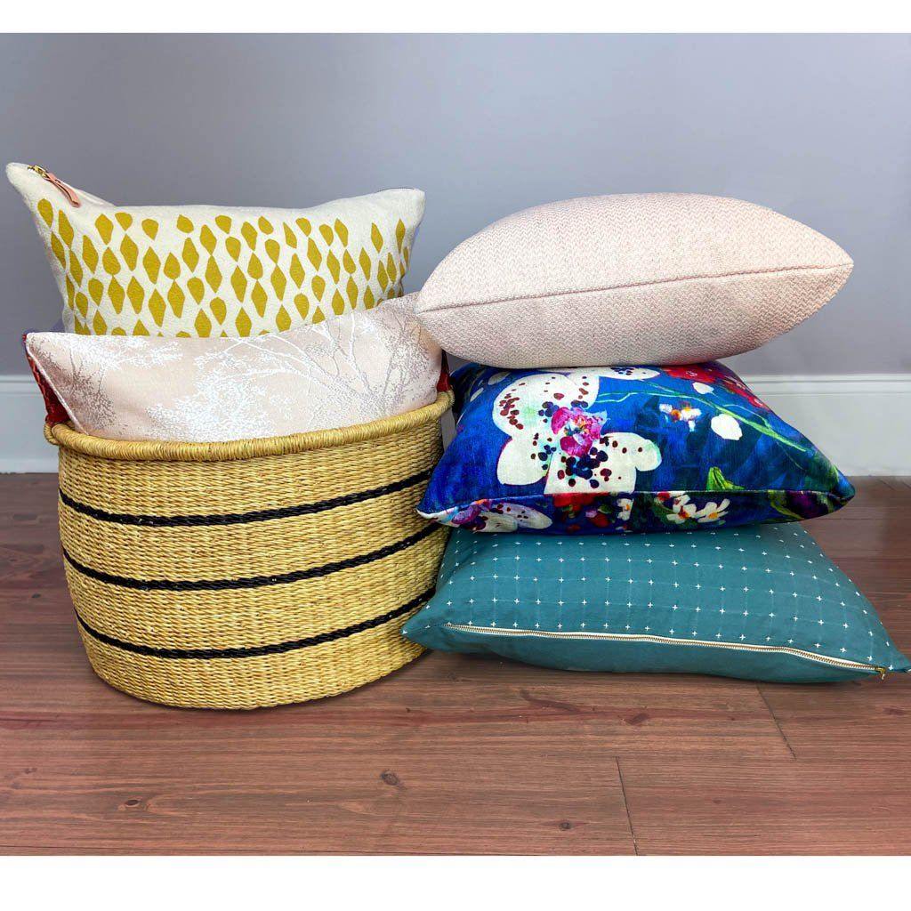 Large Basket With Handles and Throw Pillows